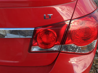 compare product 2011 Chevrolet Cruze Passenger Right Side Deck Lid Mounted Tail Light 1218526