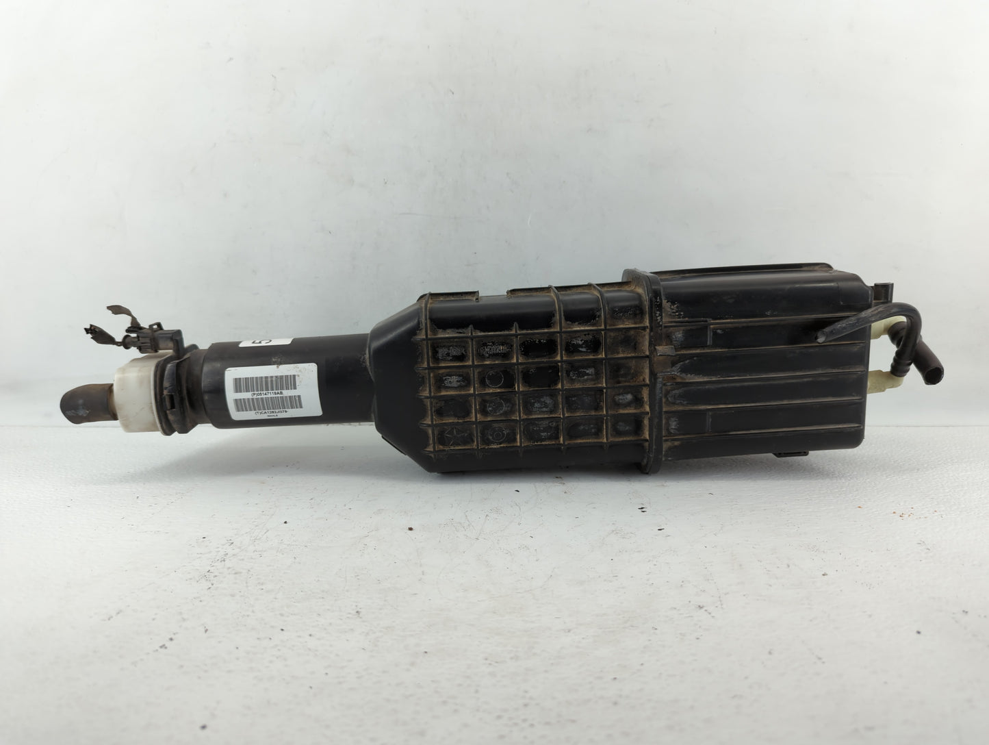 2012 Chrysler Town & Country Fuel Vapor Charcoal Canister - Oemusedautoparts1.com