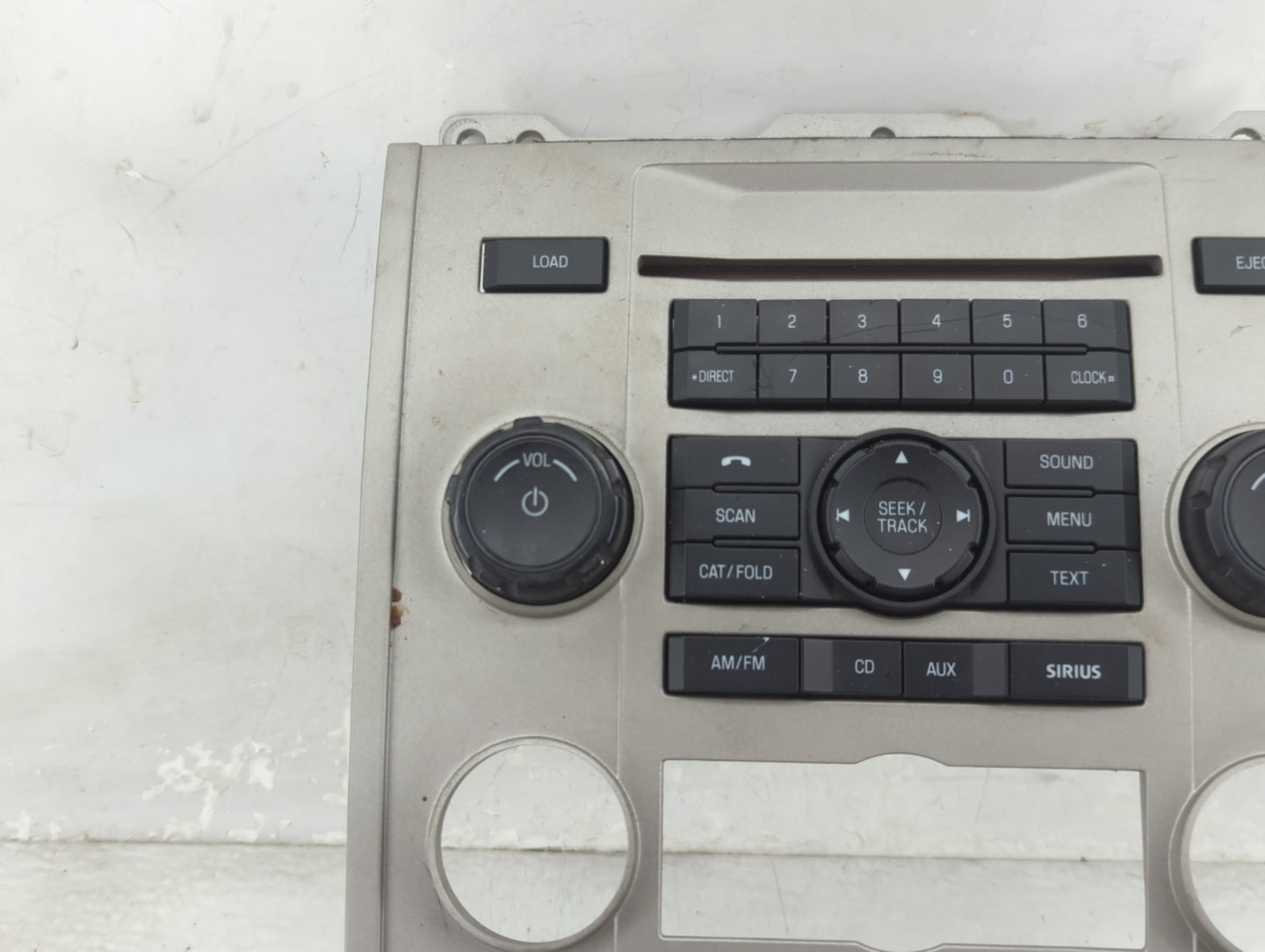 2009-2012 Ford Escape Radio Control Panel Tan - Oemusedautoparts1.com