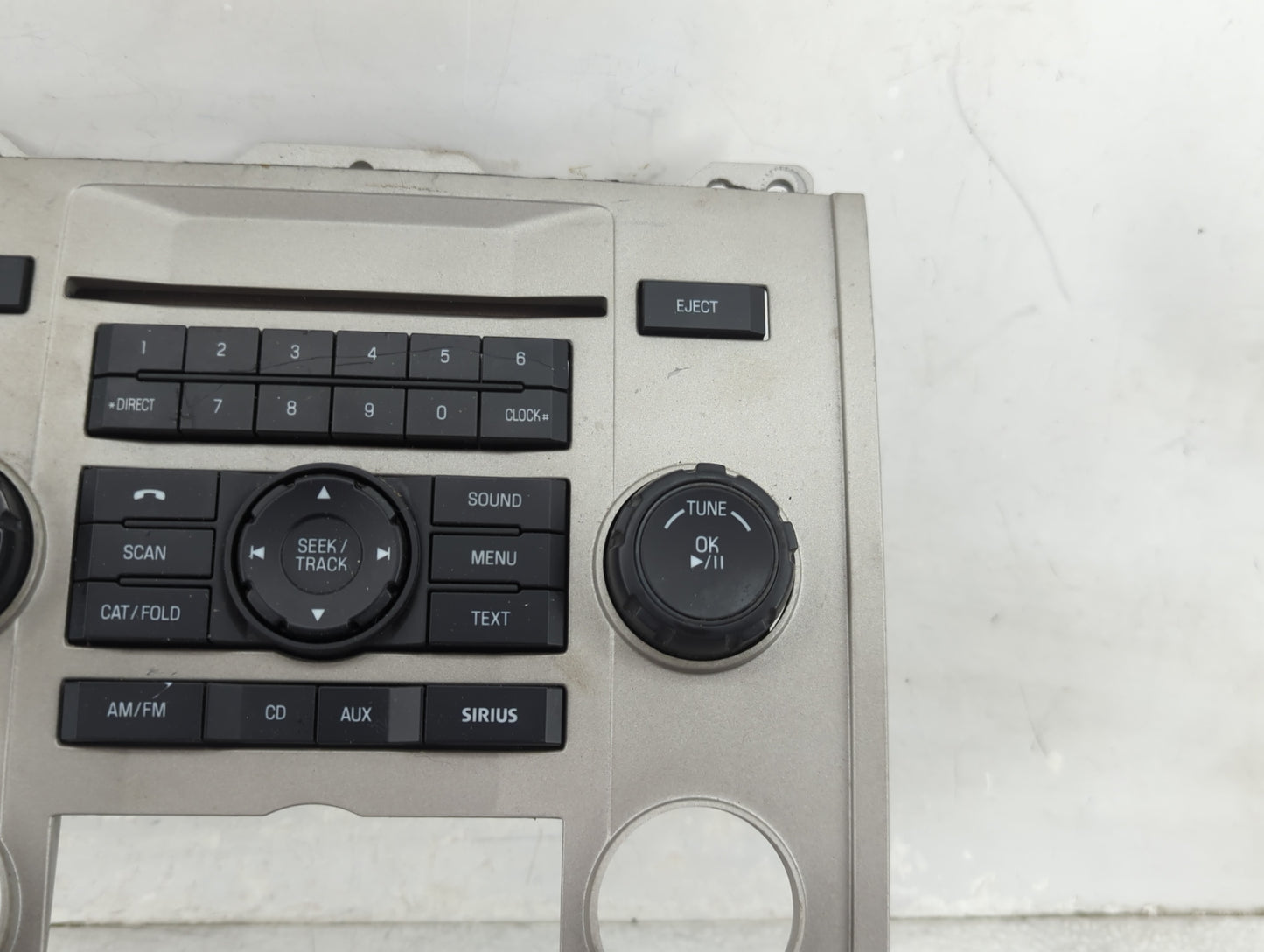 2009-2012 Ford Escape Radio Control Panel Tan - Oemusedautoparts1.com