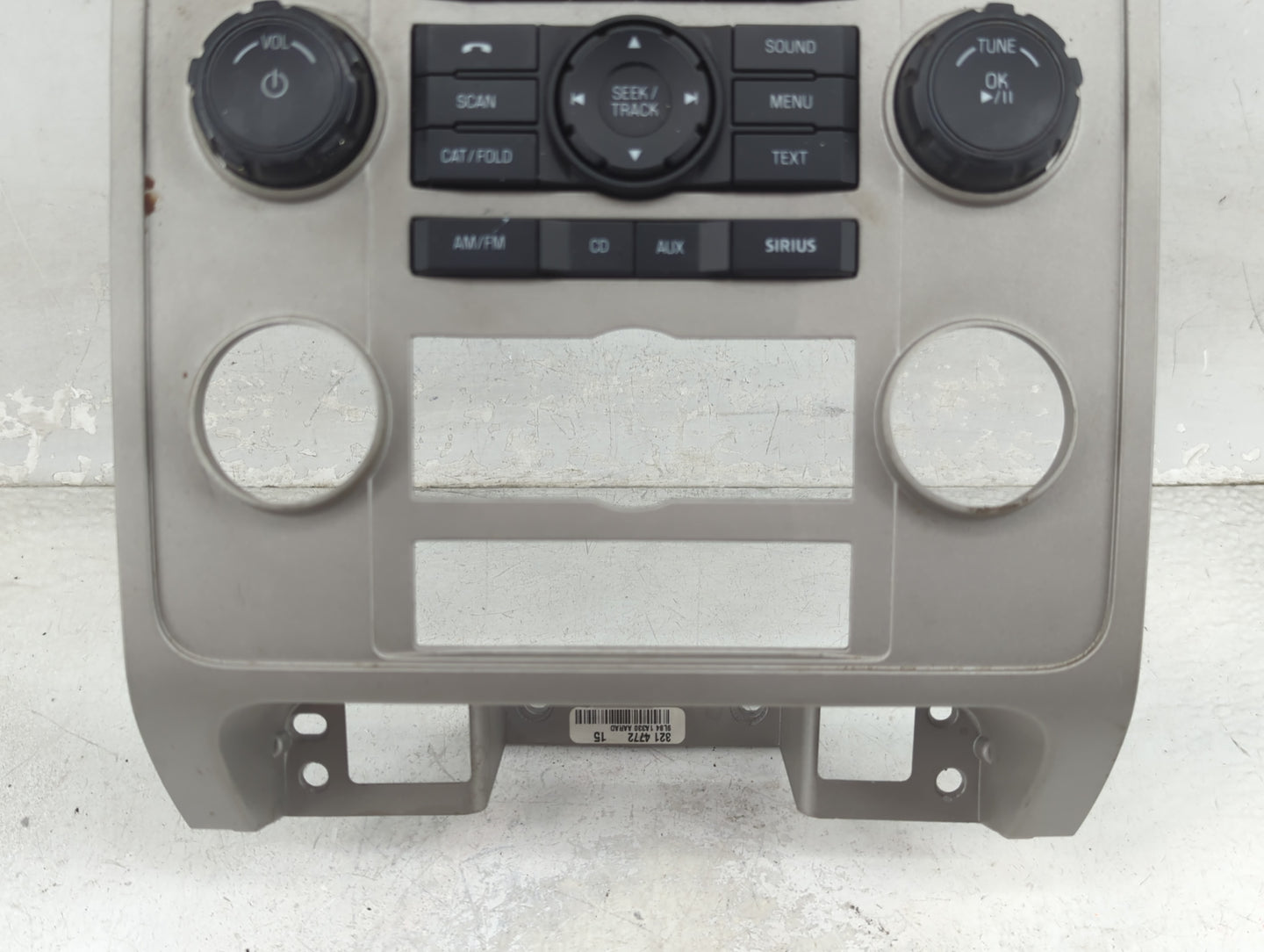 2009-2012 Ford Escape Radio Control Panel Tan - Oemusedautoparts1.com