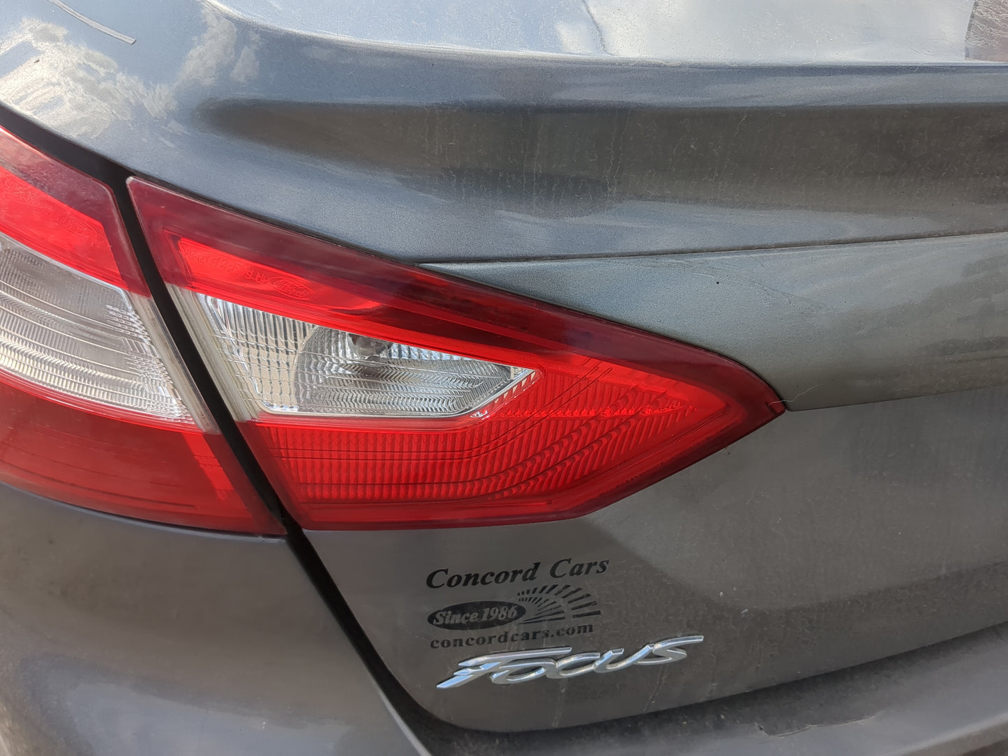 2012-2014 Ford Focus Driver Left Side Deck Lid Mounted Tail Light 1185780 - Oemusedautoparts1.com