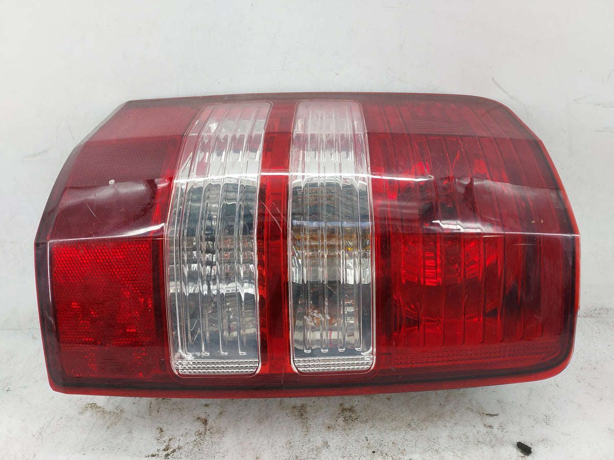2012 Jeep Liberty Tail Light Assembly Driver Left OEM P/N:3157K P27/7W Fits OEM Used Auto Parts - Oemusedautoparts1.com