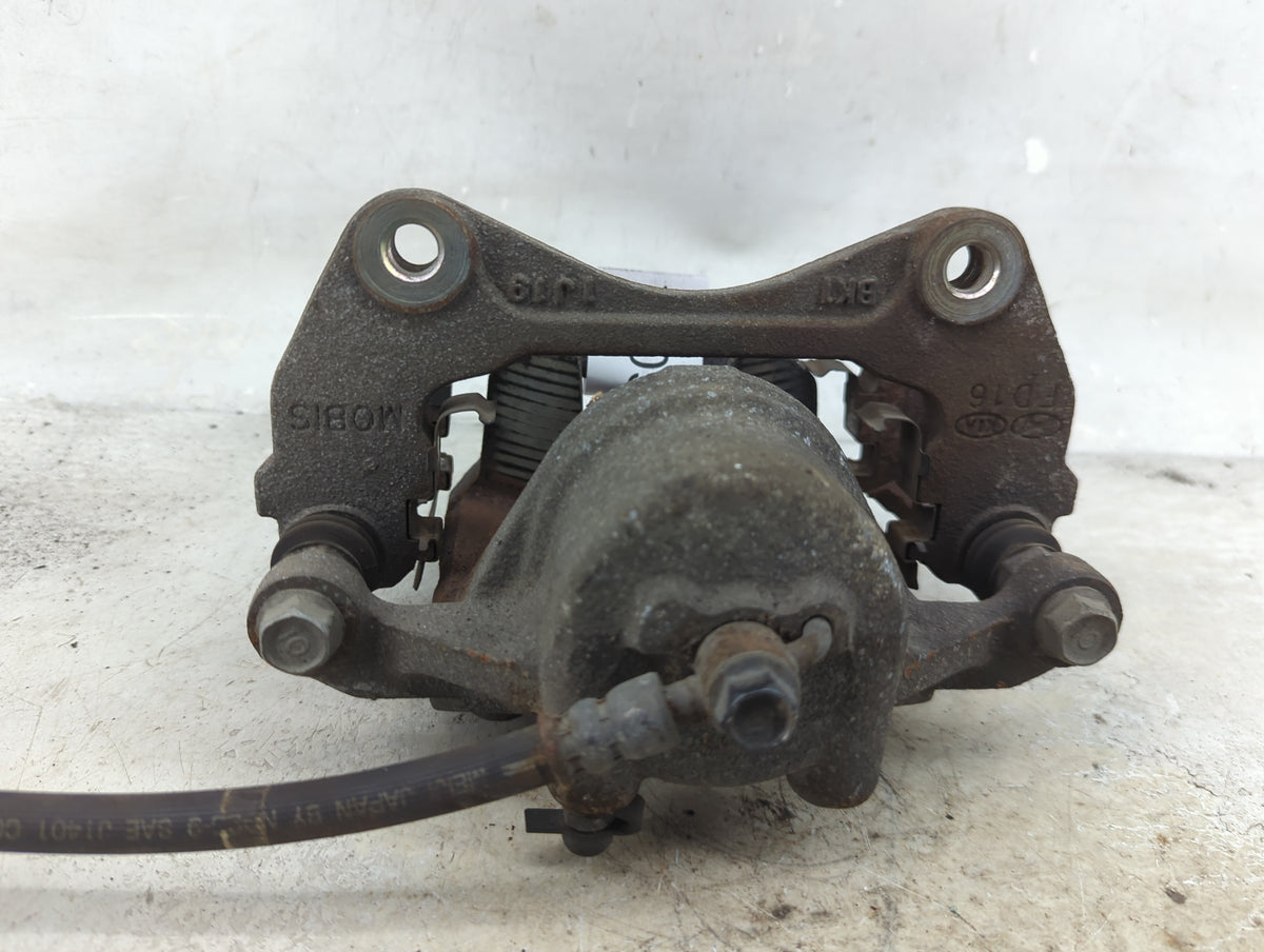 2010-2013 Kia Forte Front Driver Left Brake Caliper 1509987 - Oemusedautoparts1.com