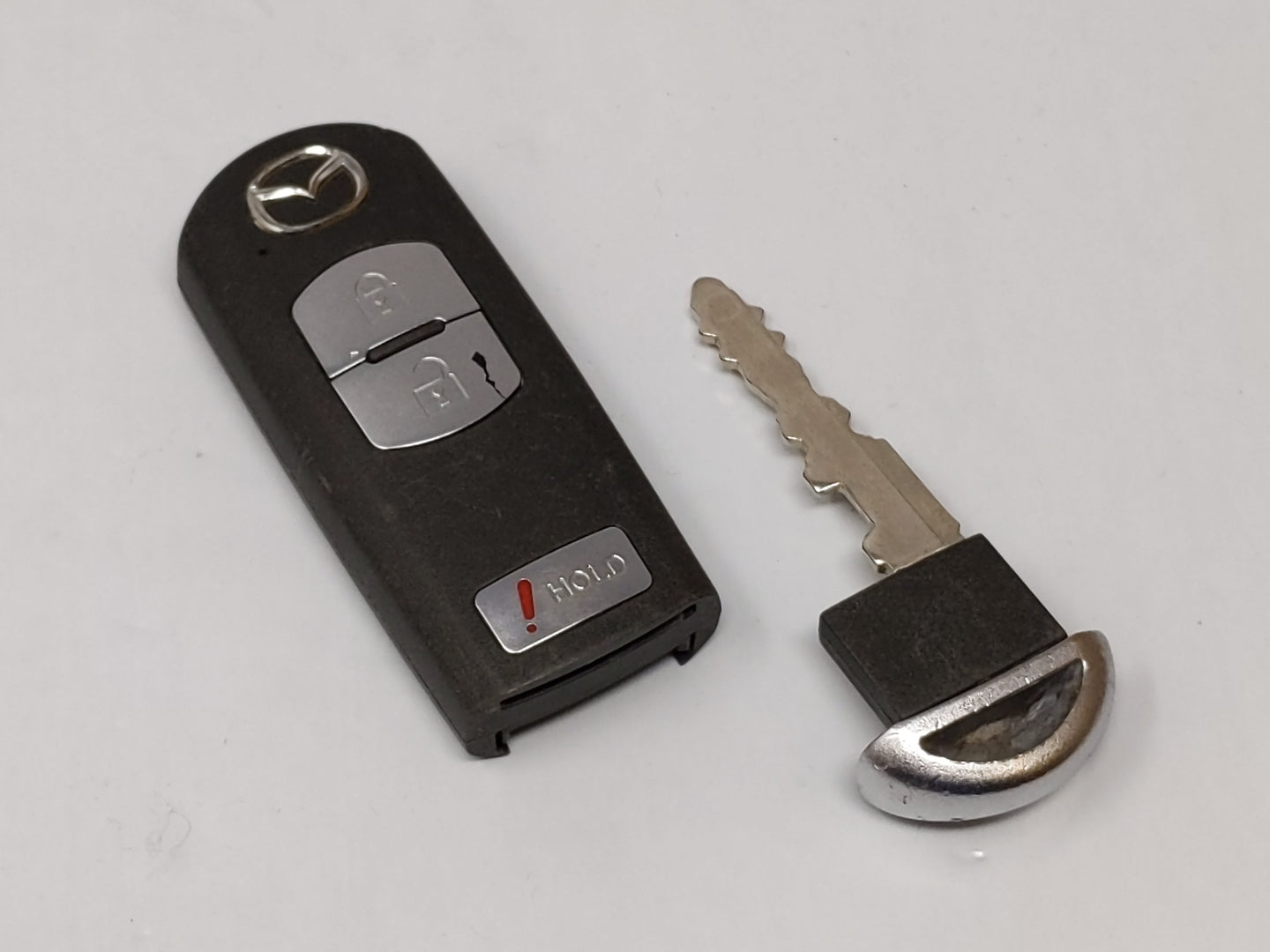 Mazda Keyless Entry Remote Wazx1t768ske11a03 3 Buttons - Oemusedautoparts1.com