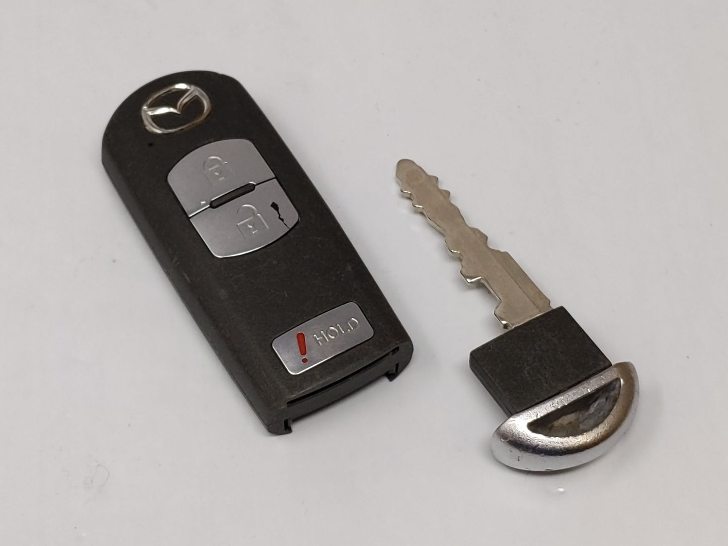 Mazda Keyless Entry Remote Wazx1t768ske11a03 3 Buttons - Oemusedautoparts1.com