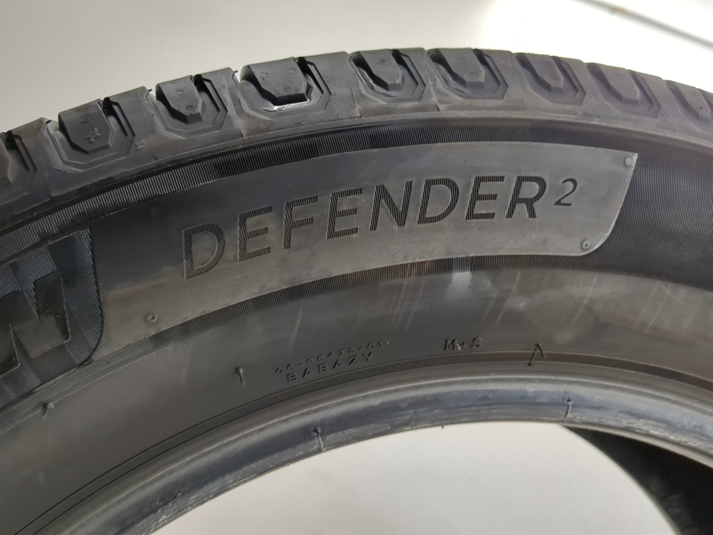 Used Tire 245/60R18 MICHELIN DEFENDER 2 105H - Tread Depth 9.5/32 - Oemusedautoparts1.com