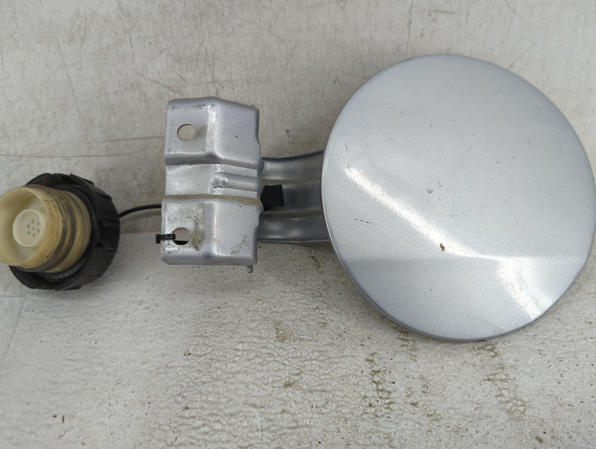 2012 Mitsubishi Lancer Fuel Tank Door Lid Gas Tank Silver - Oemusedautoparts1.com