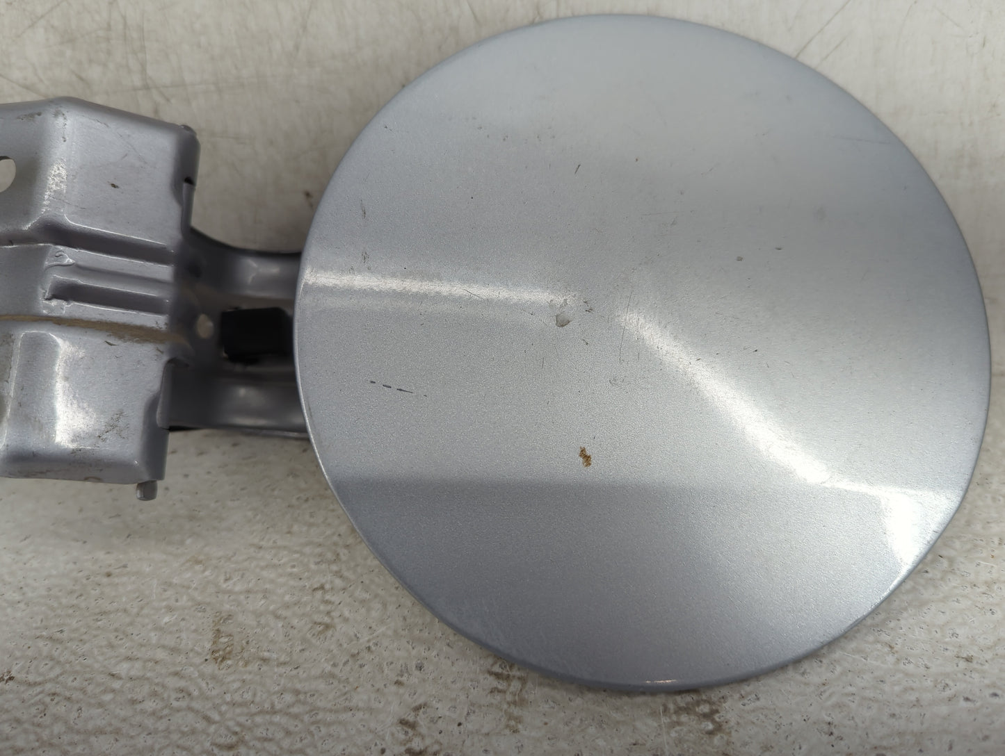 2012 Mitsubishi Lancer Fuel Tank Door Lid Gas Tank Silver - Oemusedautoparts1.com