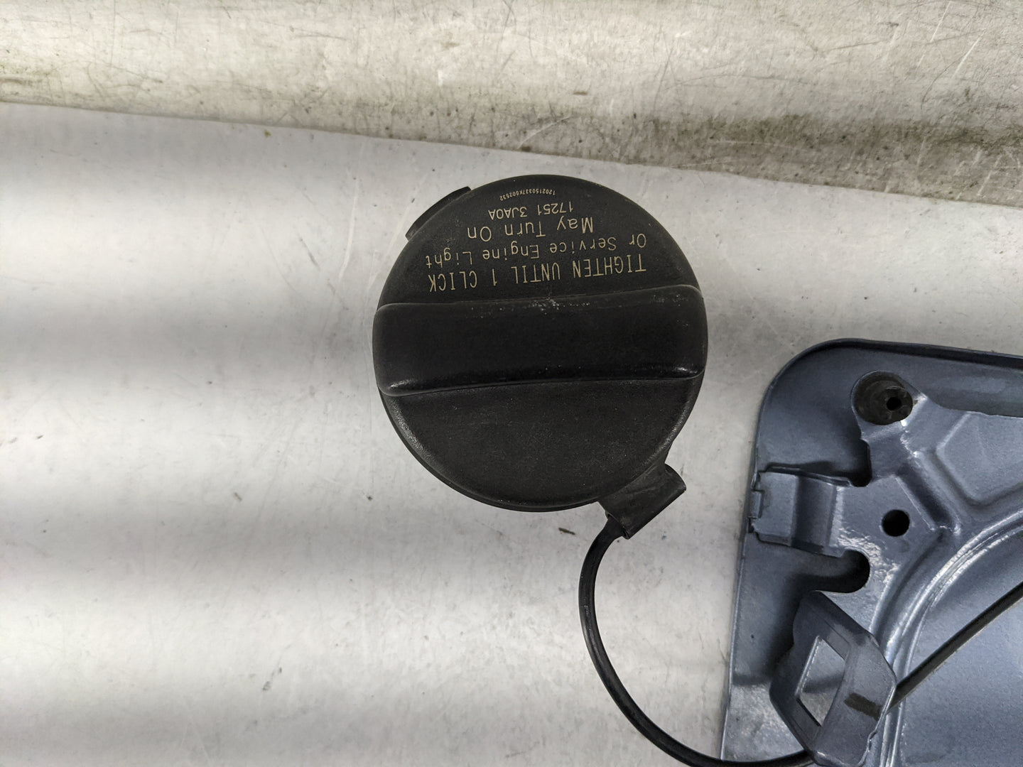 2012 Nissan Altima Fuel Tank Door Lid Gas Tank Blue - Oemusedautoparts1.com