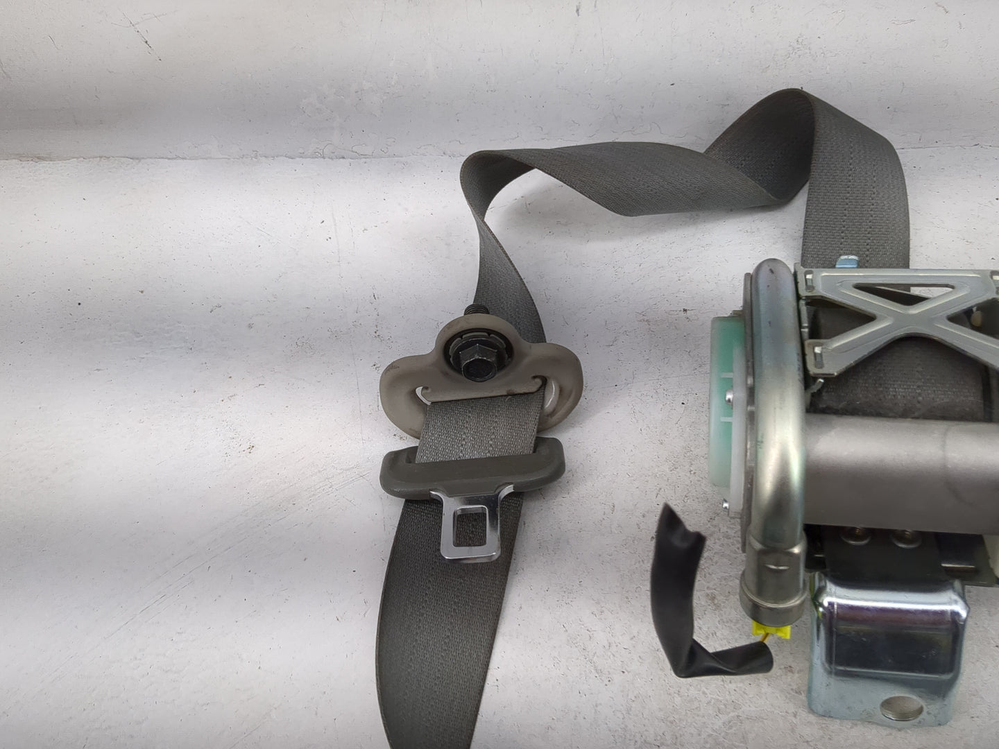2011-2012 Nissan Frontier Driver Left Seat Belt Front Retractor Gray - Oemusedautoparts1.com