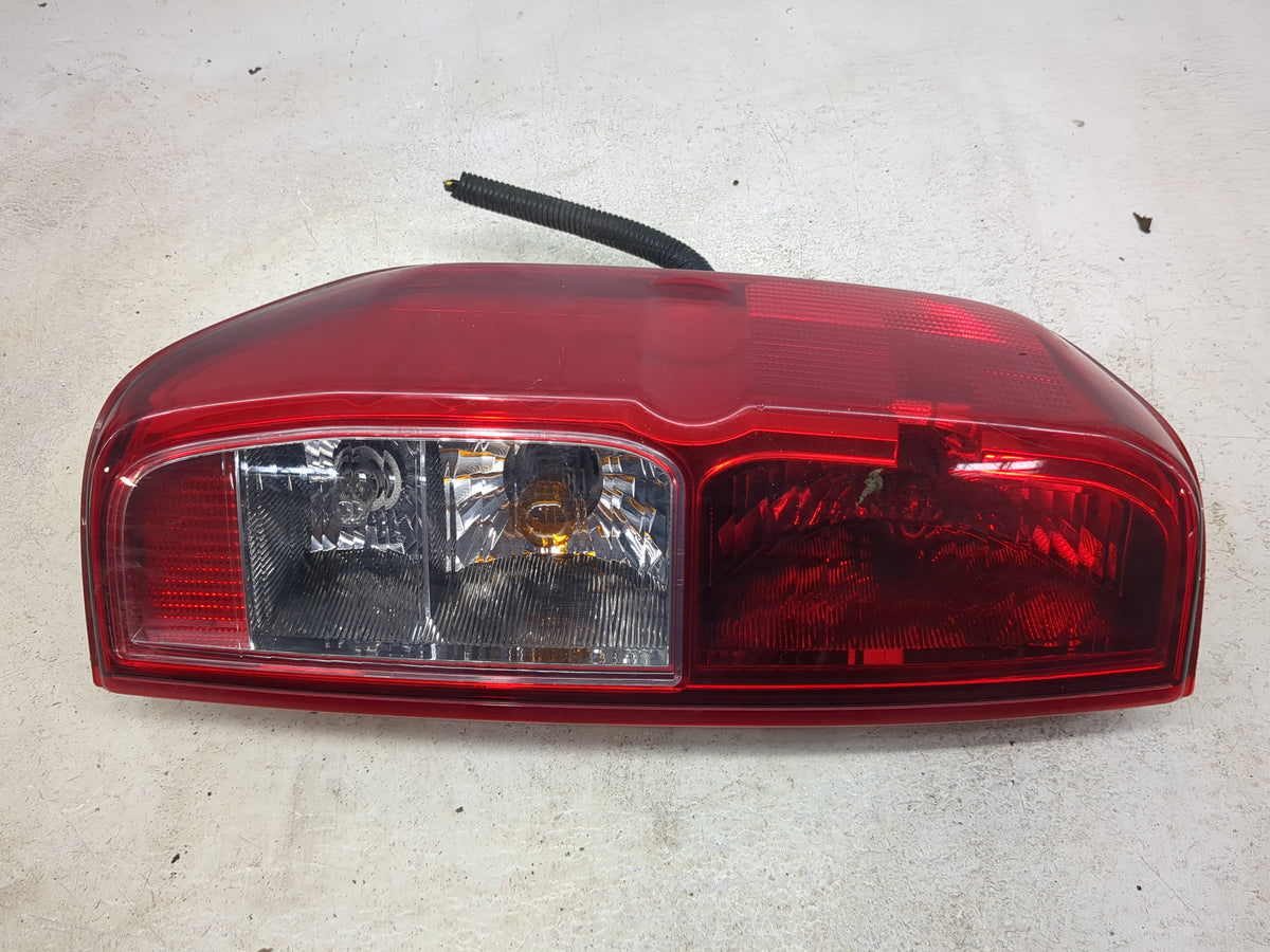 2005-2014 Nissan Frontier Tail Light Assembly Driver Left OEM P/N:26555 9BM0A 26555-9BM0A Fits OEM Used Auto Parts - Oemused