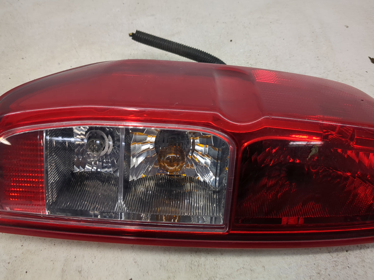 2005-2014 Nissan Frontier Tail Light Assembly Driver Left OEM P/N:26555 9BM0A 26555-9BM0A Fits OEM Used Auto Parts - Oemused