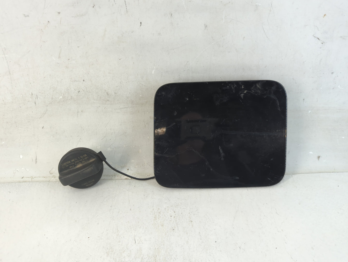 2012 Nissan Quest Fuel Tank Door Lid Gas Tank Black - Oemusedautoparts1.com