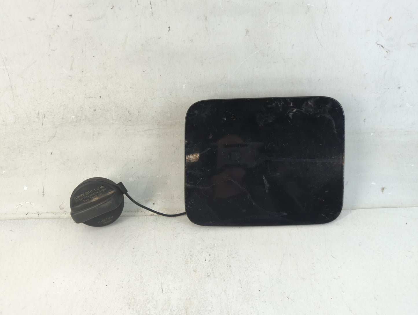 2012 Nissan Quest Fuel Tank Door Lid Gas Tank Black - Oemusedautoparts1.com