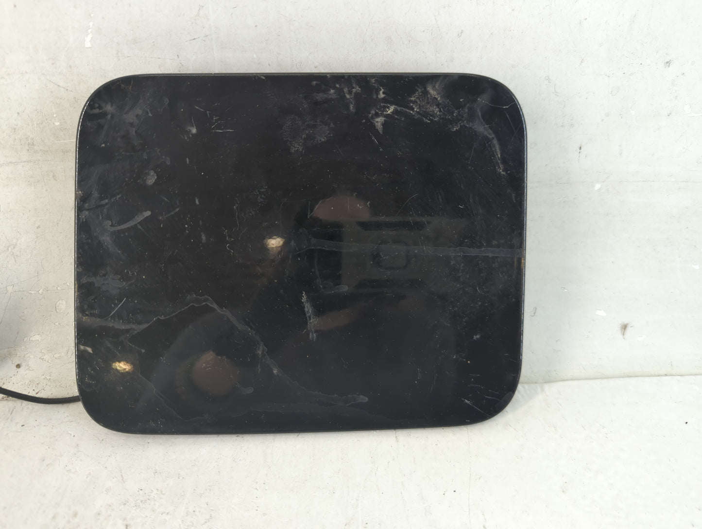 2012 Nissan Quest Fuel Tank Door Lid Gas Tank Black - Oemusedautoparts1.com