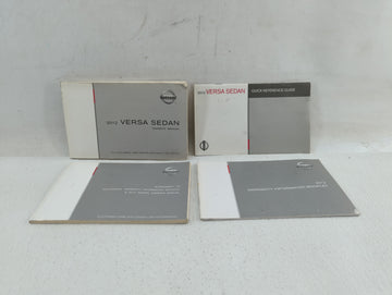 2012 Nissan Versa Owners Manual Book Guide P/N:OM2E 0N17U1 OEM Used Auto Parts