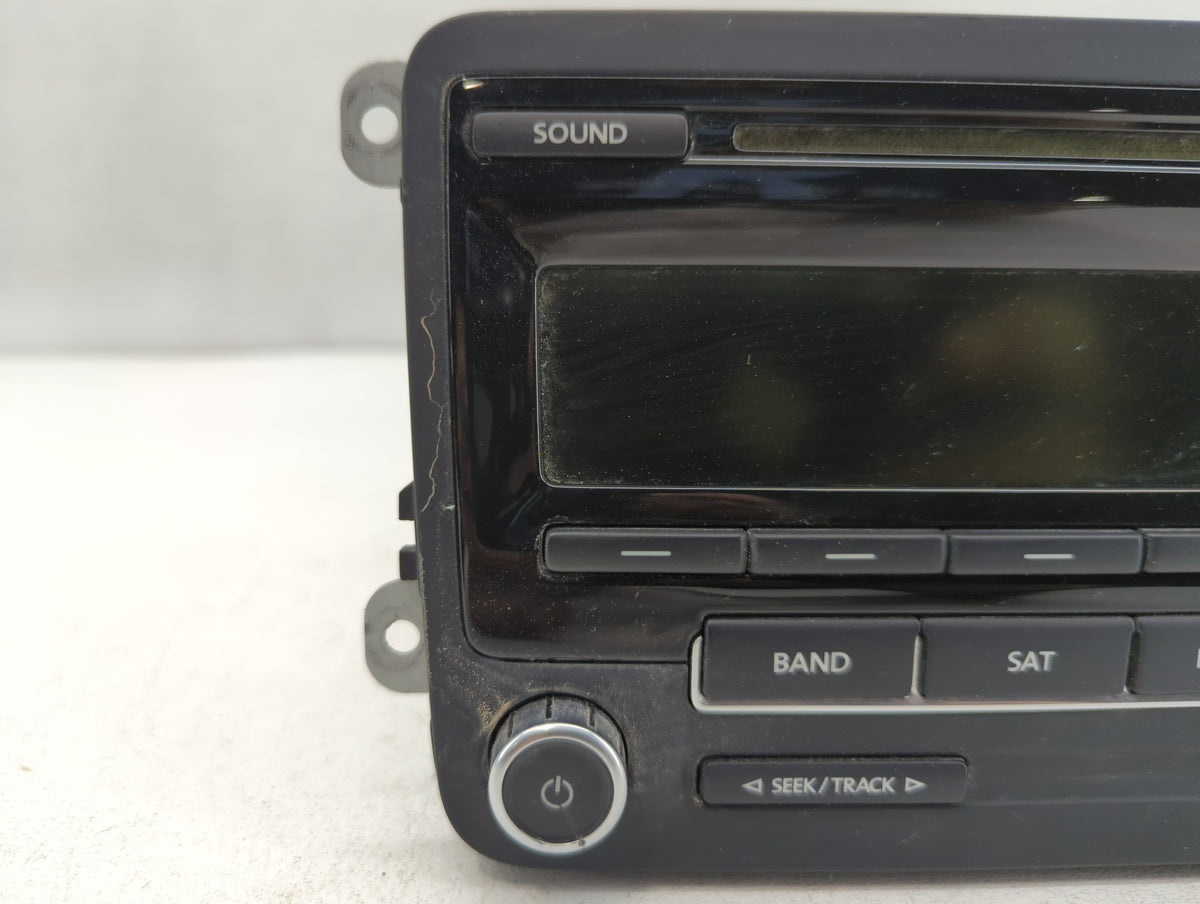 2011-2014 Volkswagen Jetta Am Fm Cd Player Radio Receiver 690557 - Oemusedautoparts1.com