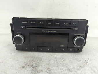 compare product 2012-2014 Volkswagen Routan Radio AM FM Cd Player Receiver Replacement P/N:P05091199AB Fits Fits 2012 2013 2014 OEM Used Auto Parts