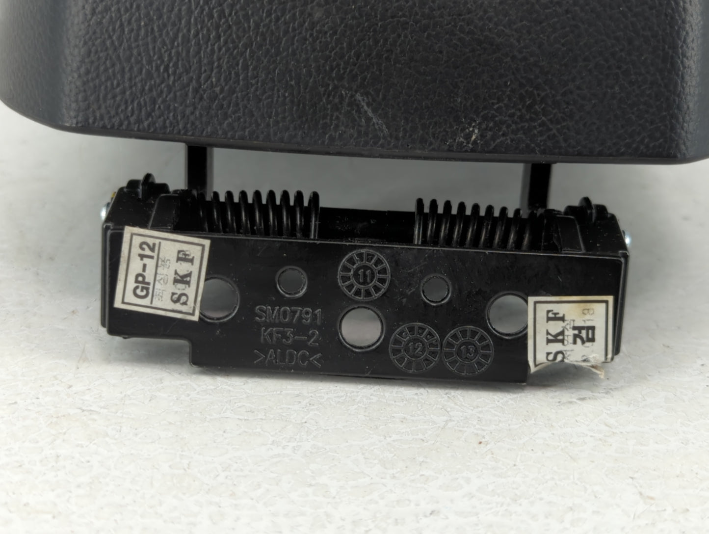 2013 Chevrolet Cruze Center Console Armrest Cover Lid Black - Oemusedautoparts1.com