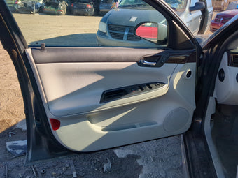 compare product 2013 Chevrolet Impala Front Left Driver Interior Door Panel Trim 1240041