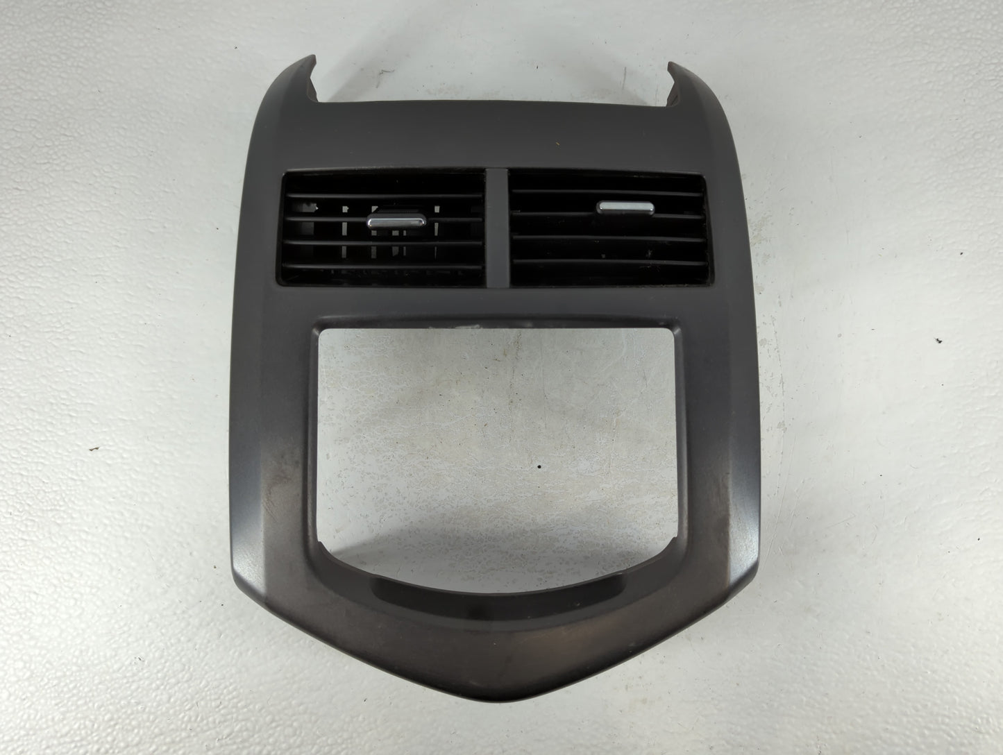 2013 Chevrolet Sonic Radio Climate Panel Bezel - Oemusedautoparts1.com