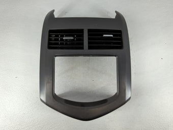 compare product 2013 Chevrolet Sonic Radio Climate Panel Bezel