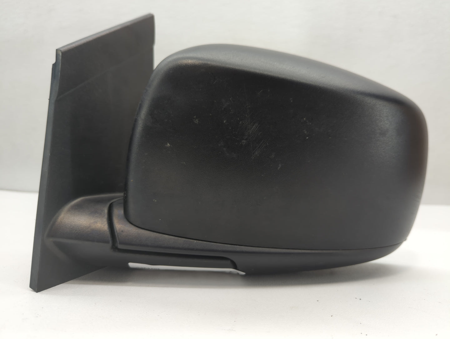 Dodge Caravan Driver Left Side View Manual Door Mirror Black - Oemusedautoparts1.com