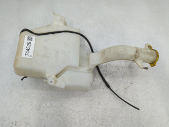 compare product Dodge Caravan Windshield Washer Fluid Reservoir Bottle Oem