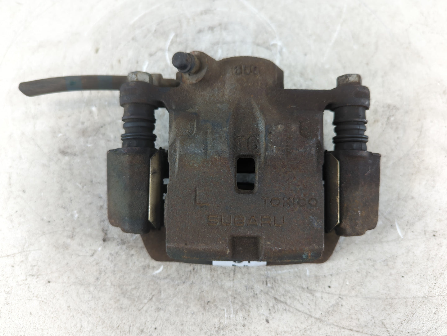 2010-2014 Subaru Impreza Front Driver Left Brake Caliper - Oemusedautoparts1.com