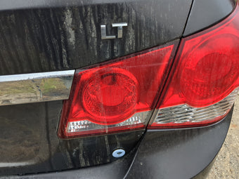 compare product 2011 Chevrolet Cruze Passenger Right Side Deck Lid Mounted Tail Light 1199564