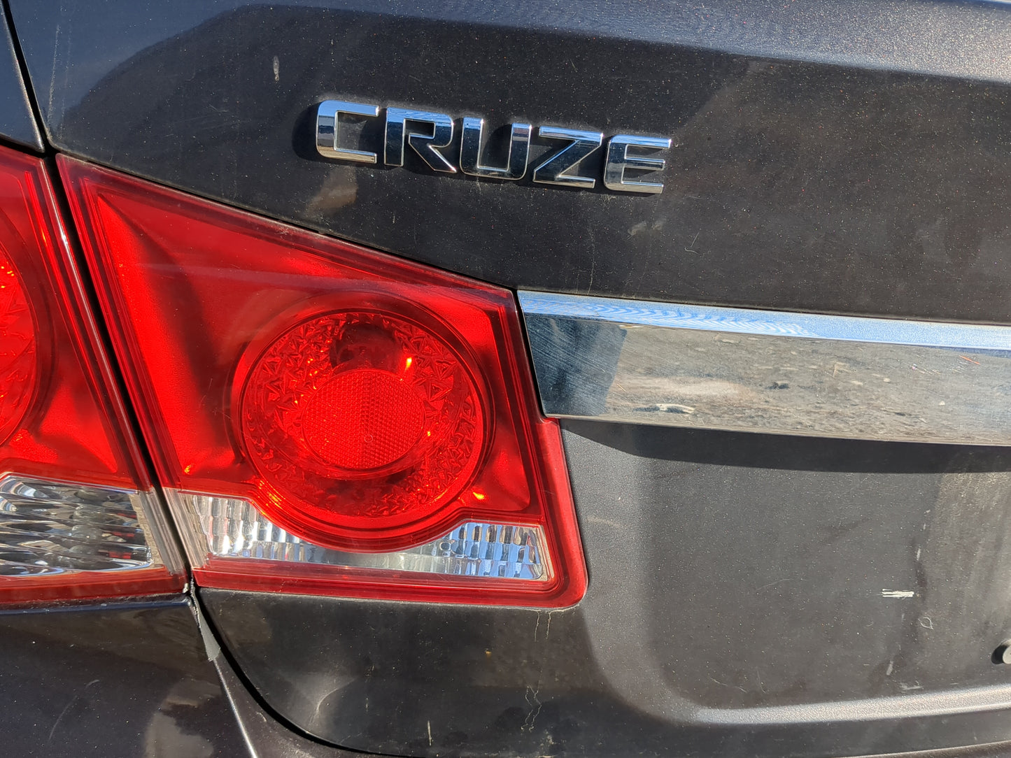 2011-2016 Chevrolet Cruze Driver Left Side Deck Lid Mounted Tail Light 1235045 - Oemusedautoparts1.com