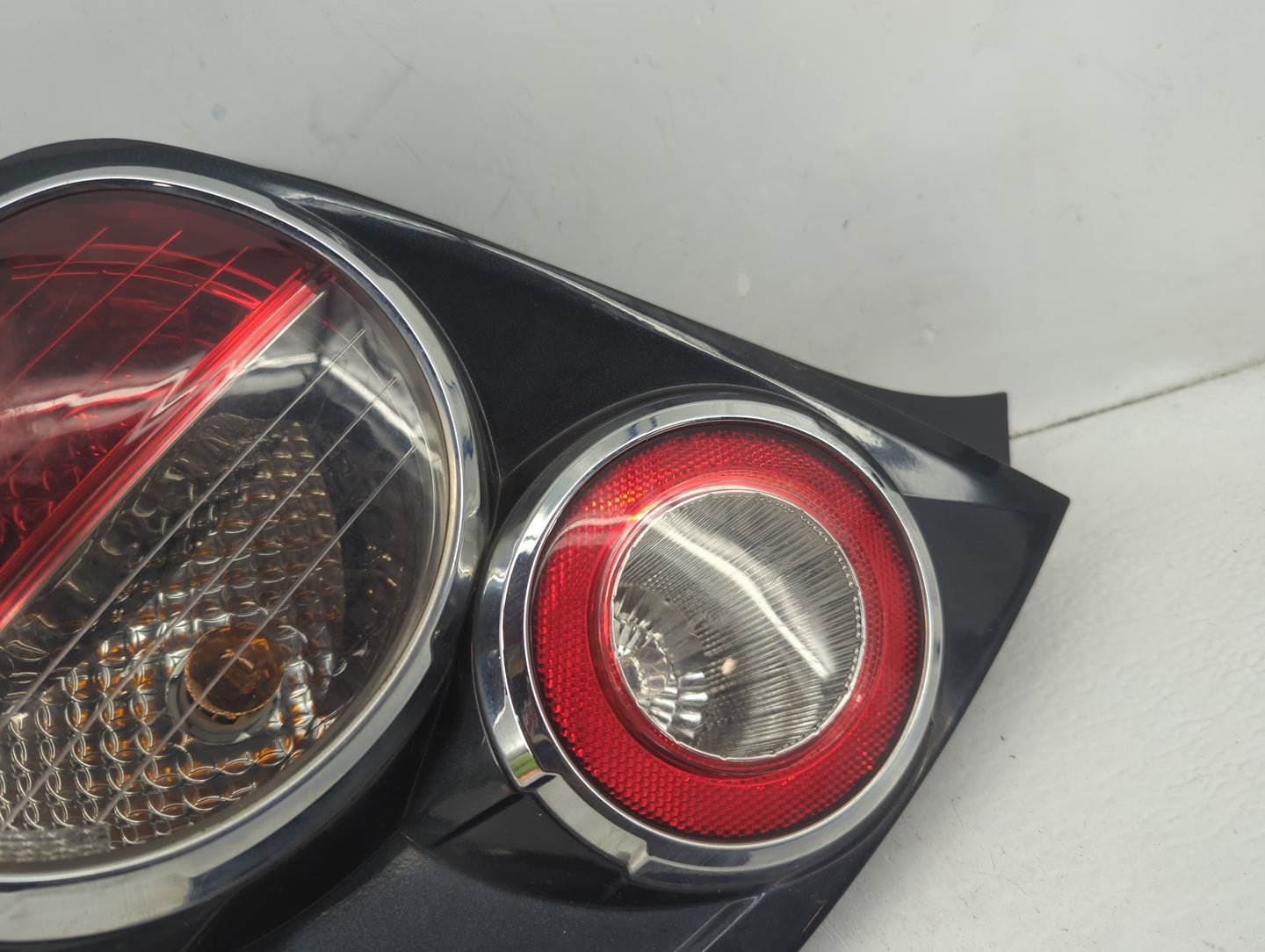 2012-2016 Chevrolet Sonic Tail Light Assembly Driver Left OEM Fits Fits 2012 2013 2014 2015 2016 OEM Used Auto Parts - Oemus