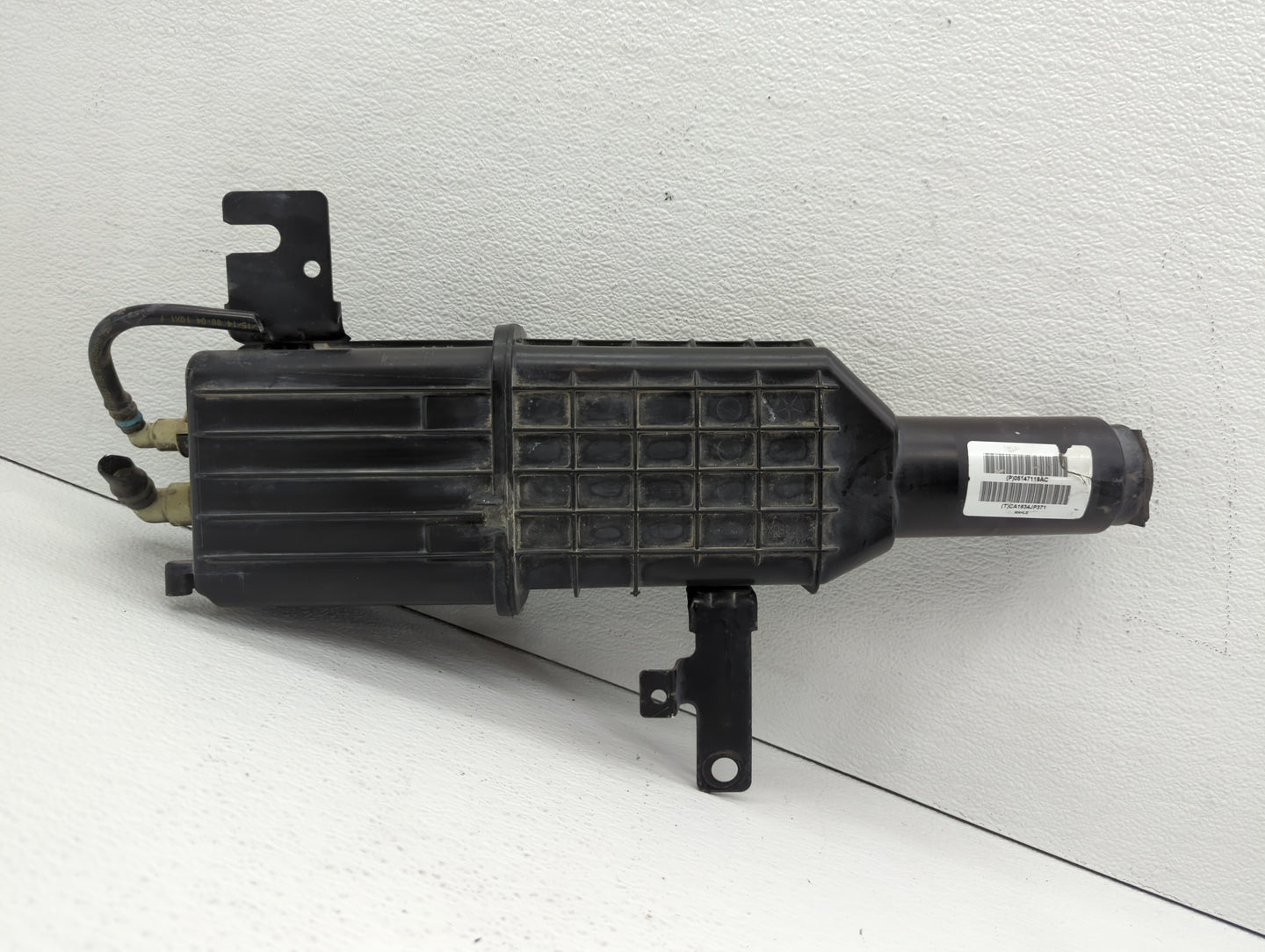 2014 Chrysler Town & Country Fuel Vapor Charcoal Canister - Oemusedautoparts1.com