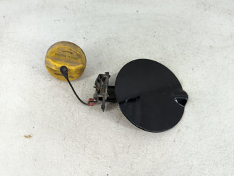 compare product 2014 Dodge Grand Caravan Fuel Tank Door Lid Gas Tank Black