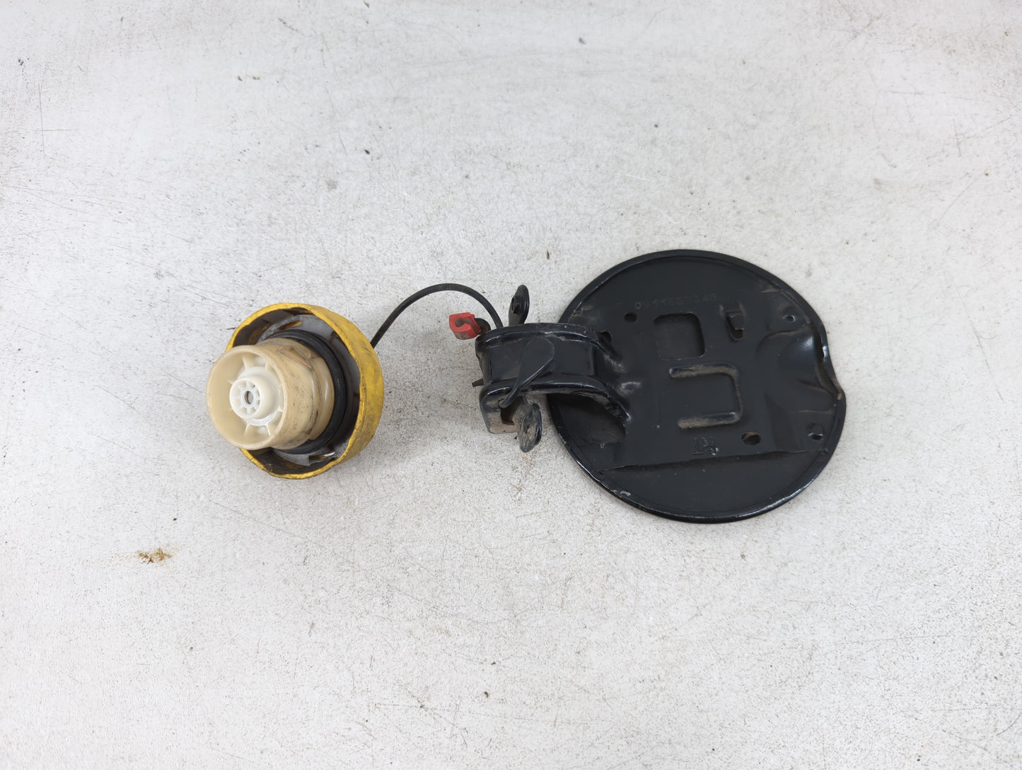2014 Dodge Grand Caravan Fuel Tank Door Lid Gas Tank Black - Oemusedautoparts1.com