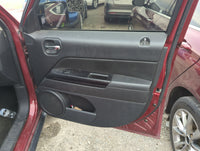 2014 Jeep Patriot Front Right Passenger Interior Door Panel Trim - Oemusedautoparts1.com