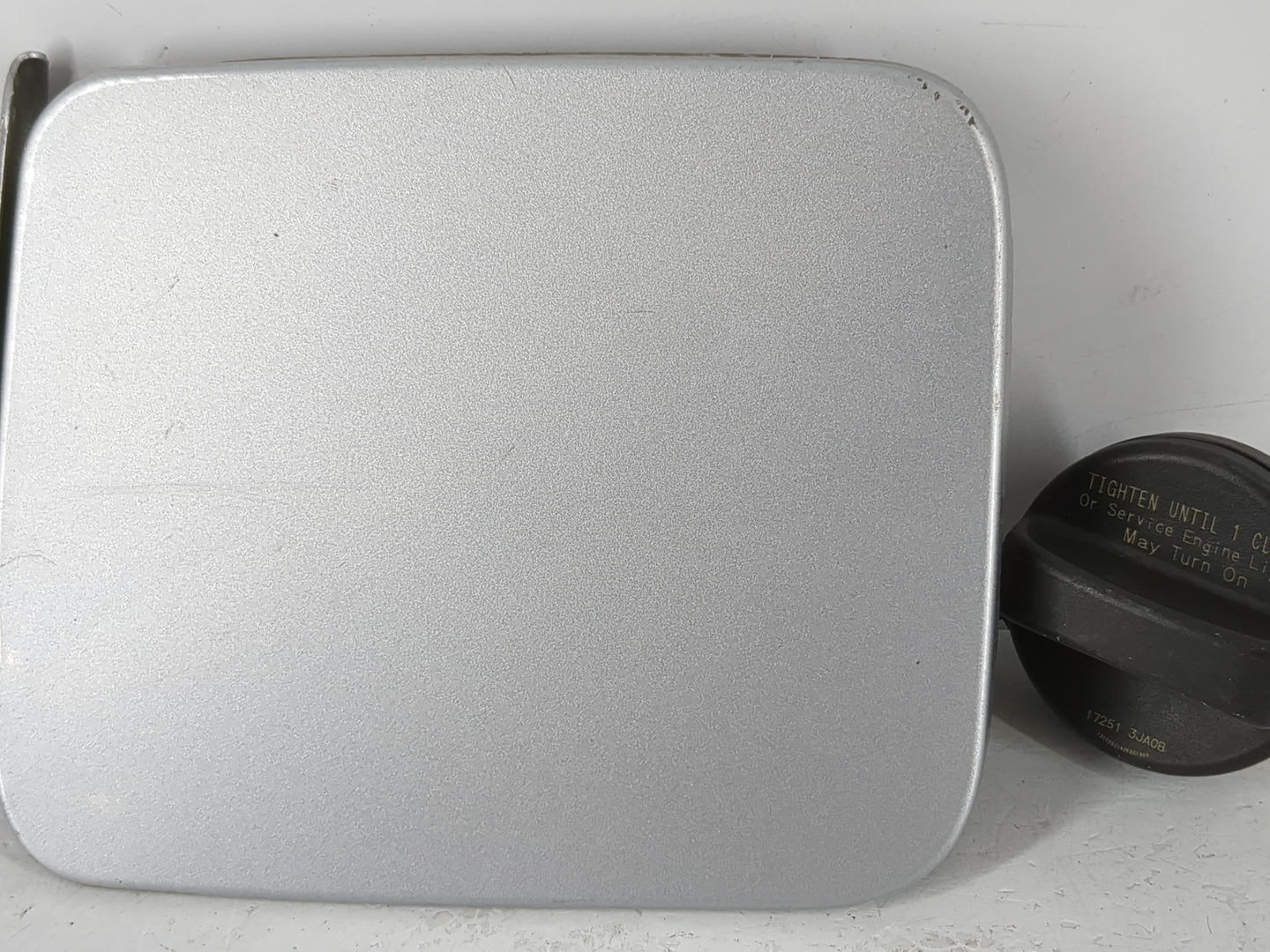 2014 Nissan Altima Fuel Tank Door Lid Gas Tank - Oemusedautoparts1.com