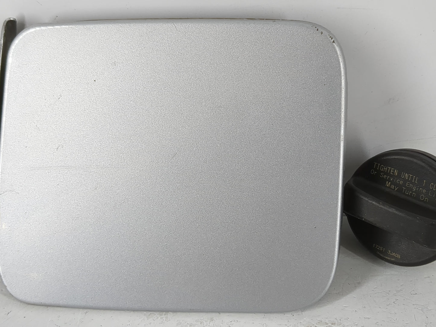 2014 Nissan Altima Fuel Tank Door Lid Gas Tank - Oemusedautoparts1.com