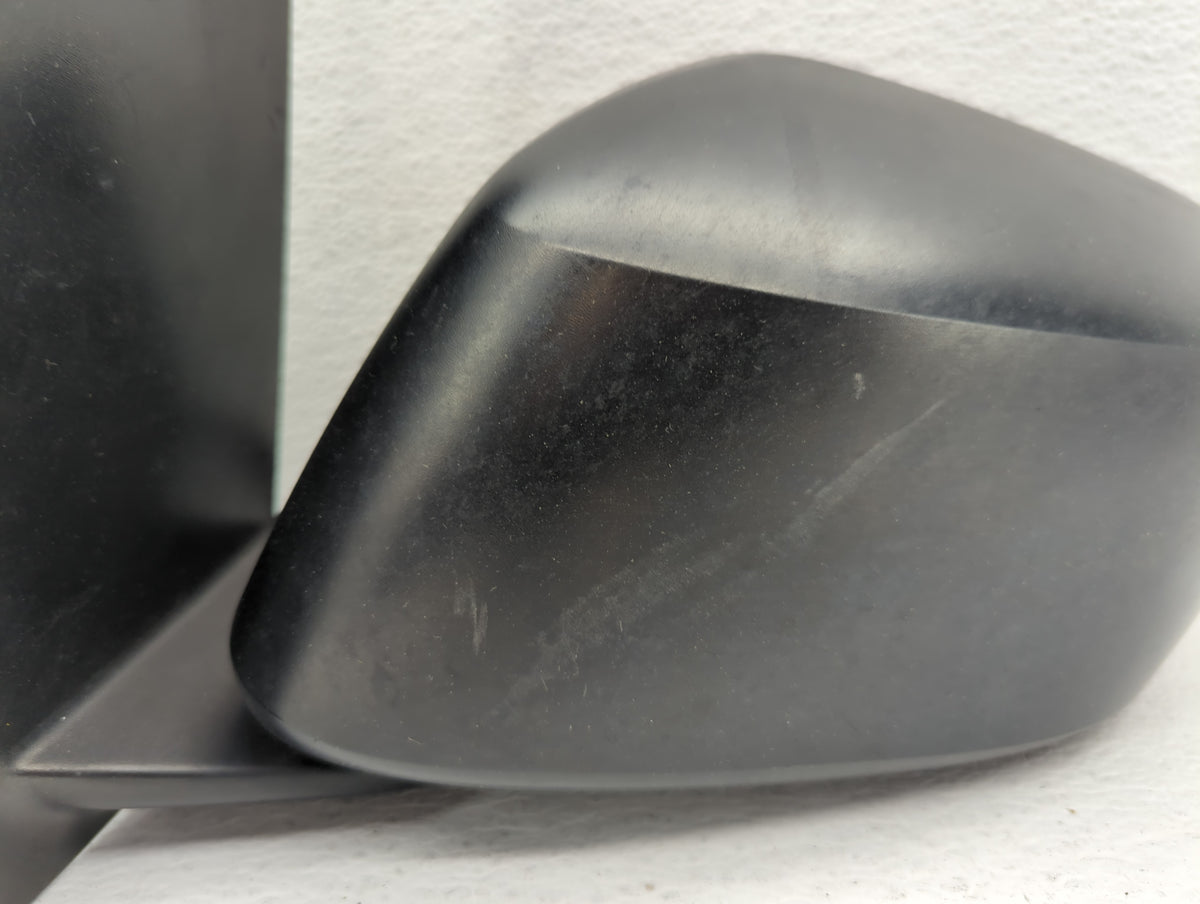 Nissan Ram 1500 Driver Left Side View Manual Door Mirror Black - Oemusedautoparts1.com