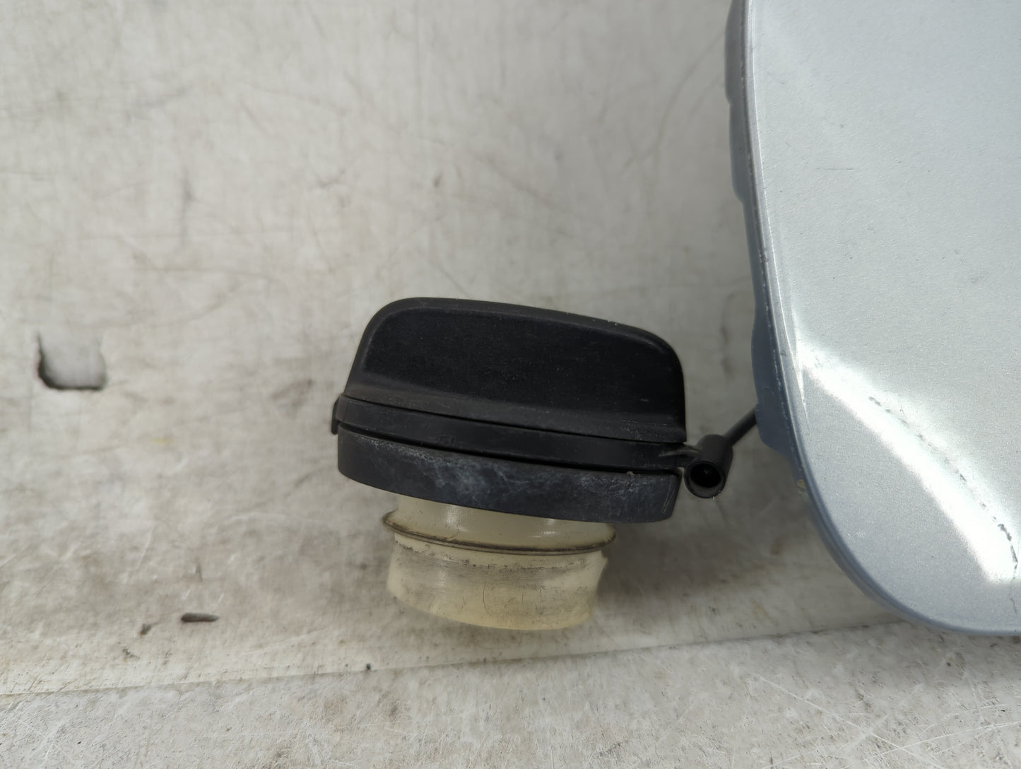 2014 Nissan Rogue Fuel Tank Door Lid Gas Tank Gray - Oemusedautoparts1.com