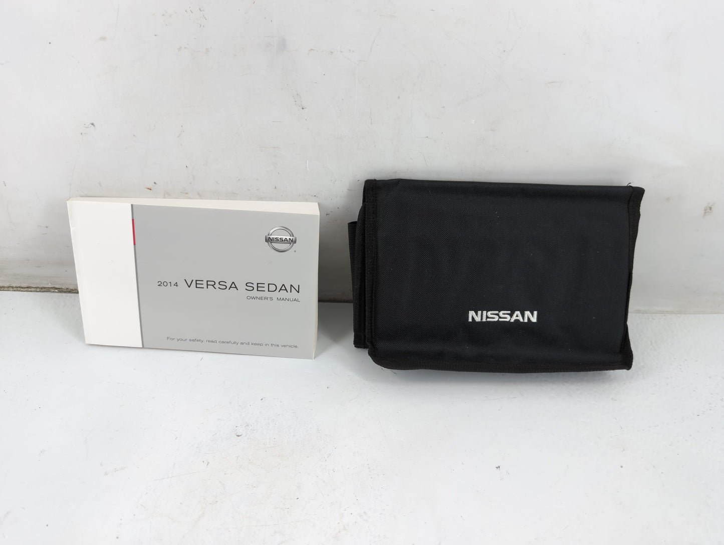 2014 Nissan Versa Owners Manual Book Guide P/N:OM14E ON17U1 OEM Used Auto Parts - Oemusedautoparts1.com