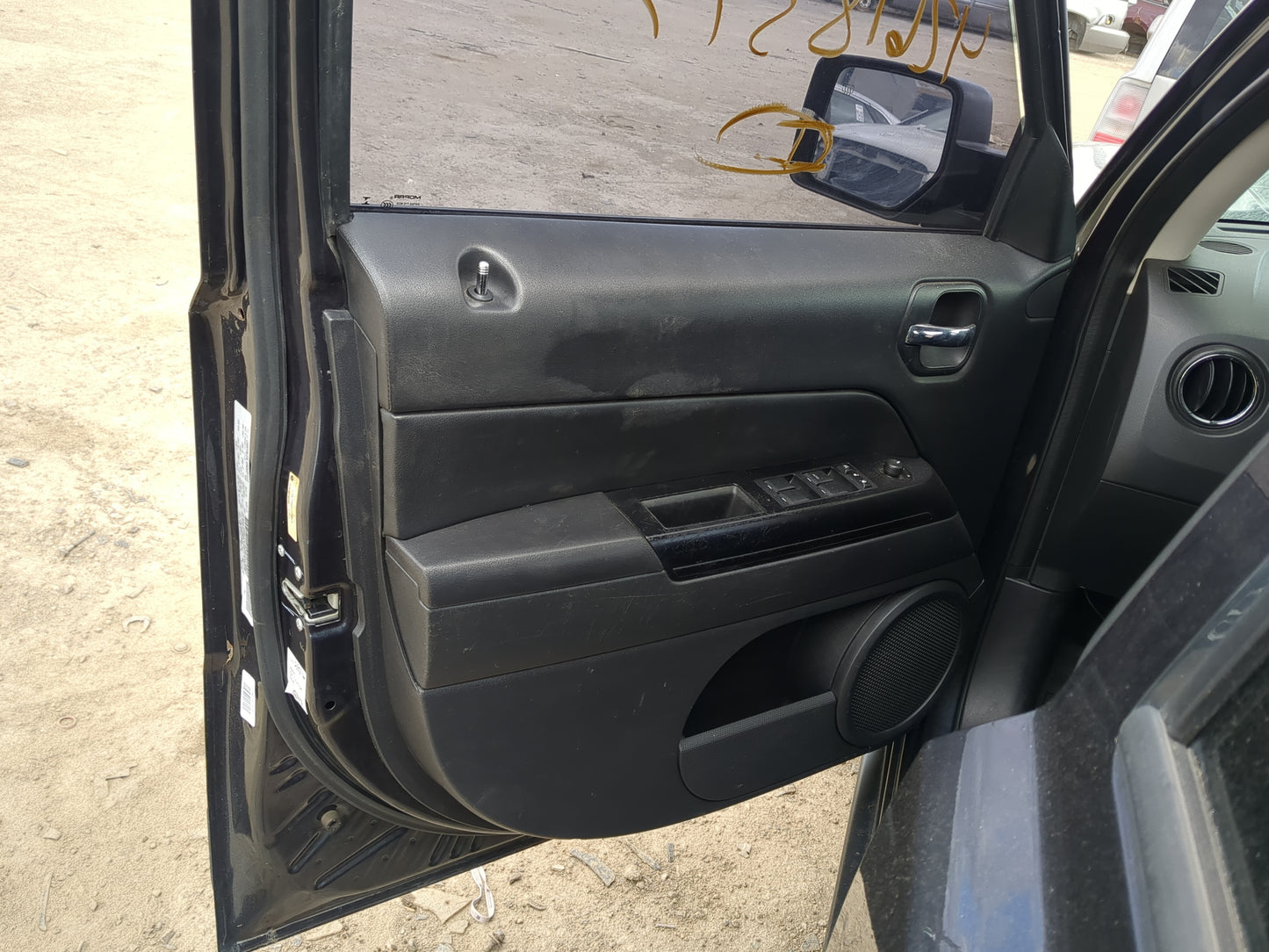 2015 Jeep Patriot Front Left Driver Interior Door Panel Trim - Oemusedautoparts1.com