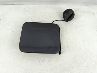 compare product 2015 Nissan Versa Fuel Tank Door Lid Gas Tank Black