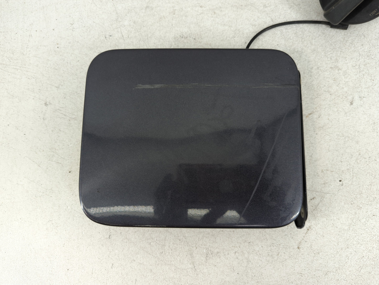2015 Nissan Versa Fuel Tank Door Lid Gas Tank Black - Oemusedautoparts1.com