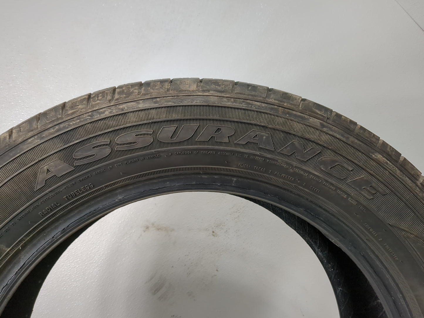 Used Tire 235/55R18 GOODYEAR ASSURANCE ALL SEASON 100H - Tread Depth 6/32 - Oemusedautoparts1.com