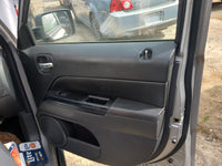 2016 Jeep Patriot Front Right Passenger Interior Door Panel Trim 1186482 - Oemusedautoparts1.com