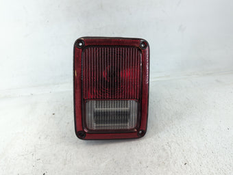 compare product 2007-2018 Jeep Wrangler Tail Light Assembly Driver Left OEM P/N:4929930 Fits OEM Used Auto Parts