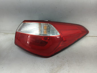 compare product 2014-2017 Kia Forte Tail Light Assembly Passenger Right OEM P/N:13705 13708, R1Y-S102 Fits Fits 2014 2015 2016 2017 OEM Used Auto Parts