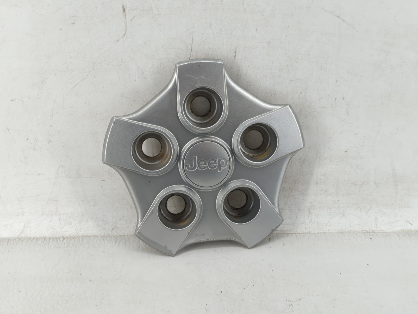 2017 Jeep Patriot Rim Wheel Center Cap Silver 447924 - Oemusedautoparts1.com
